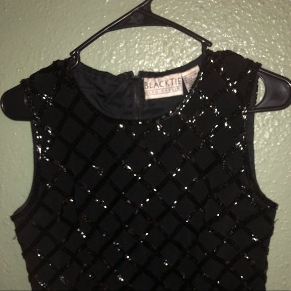 Sleeveless sequined top. - Picture 2 of 3